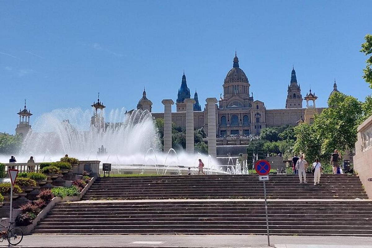 a fountain in front of a large building with a fountain