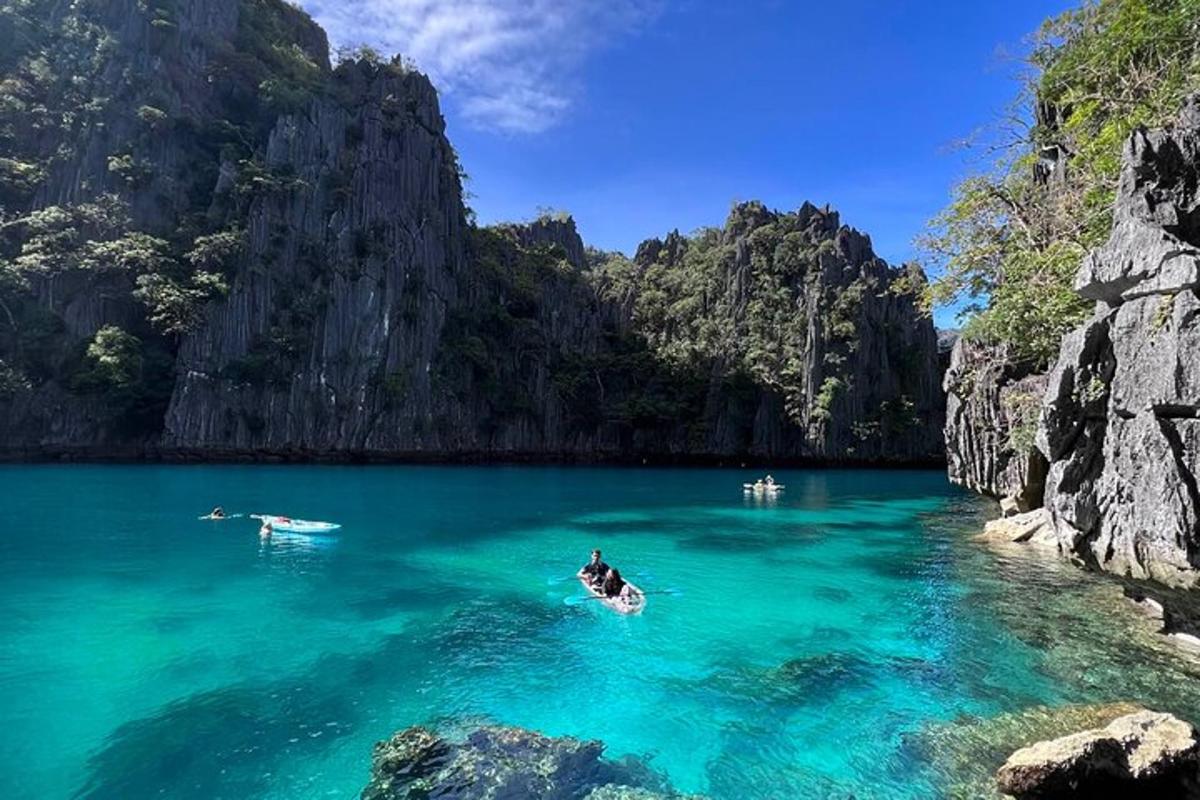 a group of people in boats in a body of water