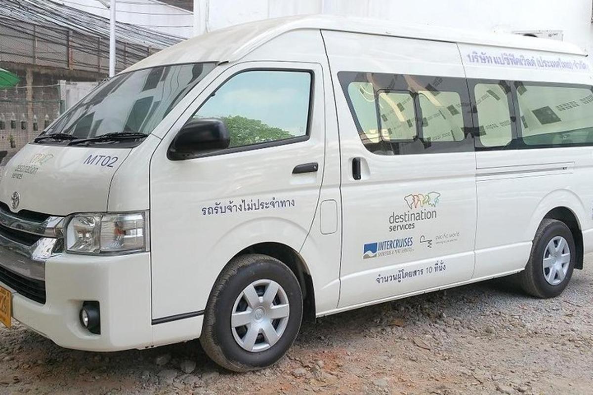 a white van parked next to a building