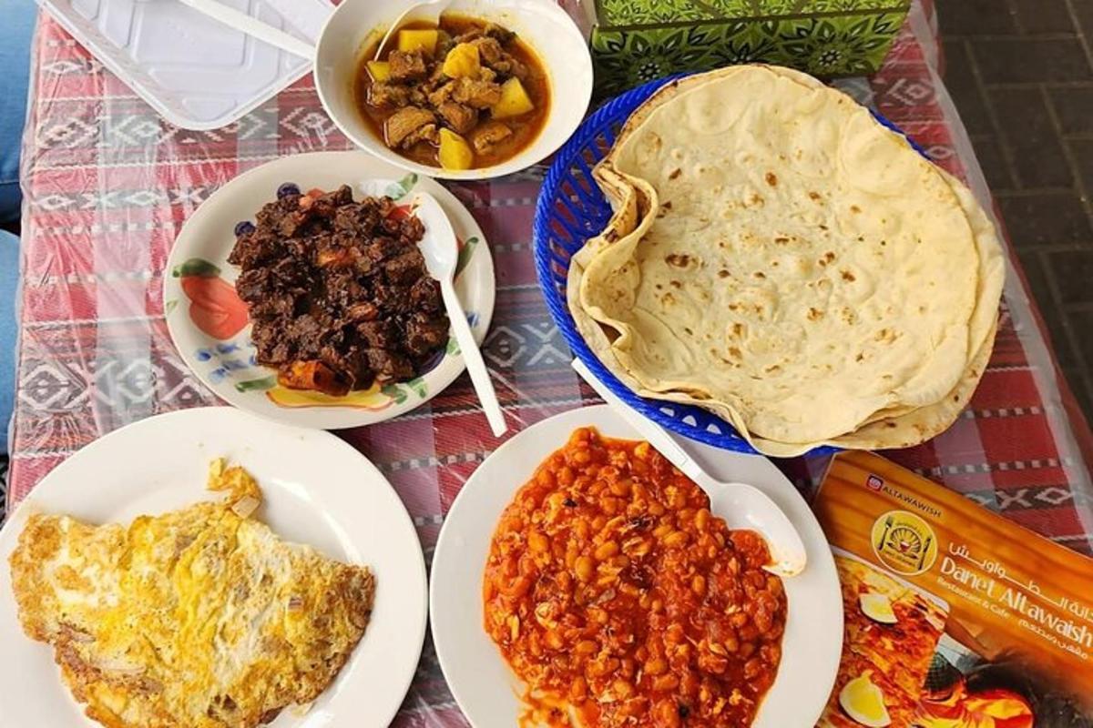 a table with plates of food on a table