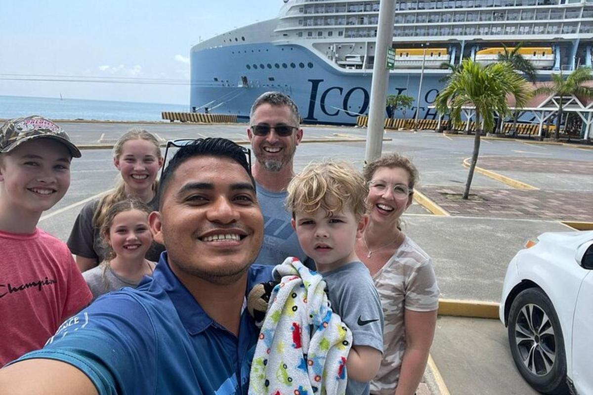 a man and a group of people with a cruise ship