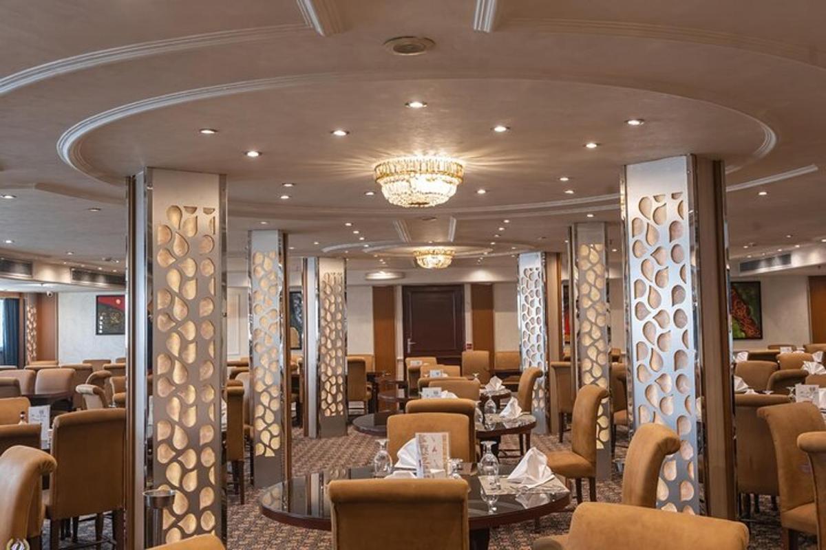 a restaurant on a cruise ship with tables and chairs