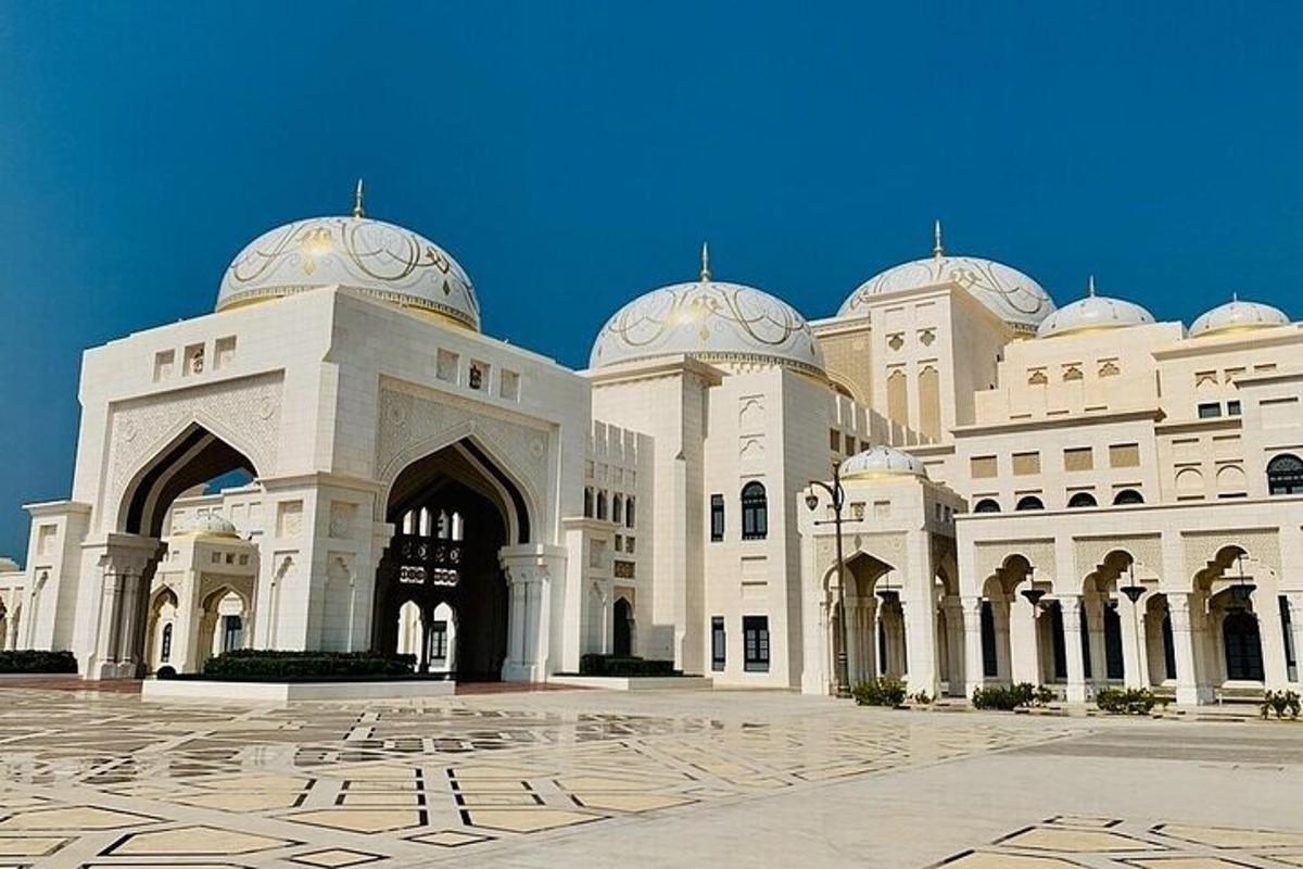 a large white building with domes on top of it