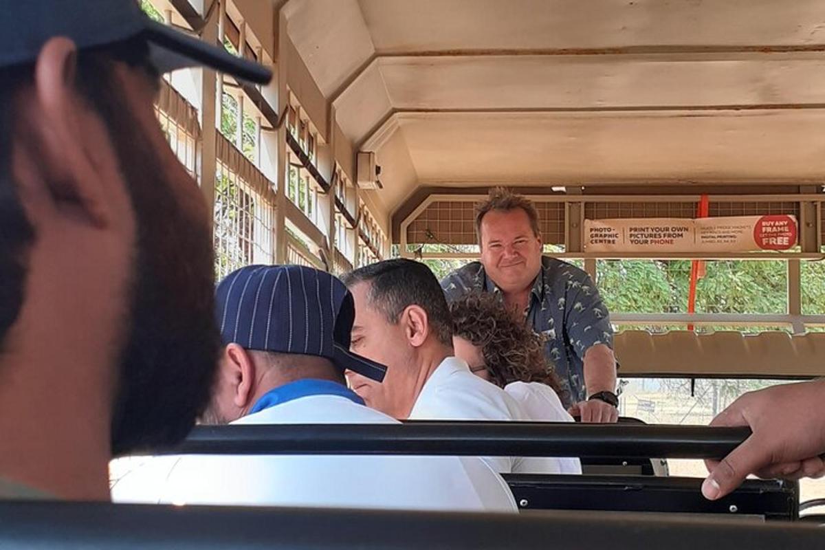 a group of people sitting on a bus