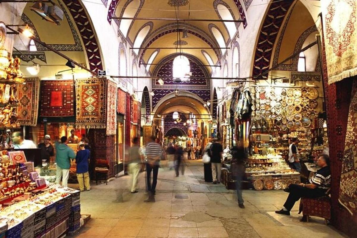 a market with people walking around in a building