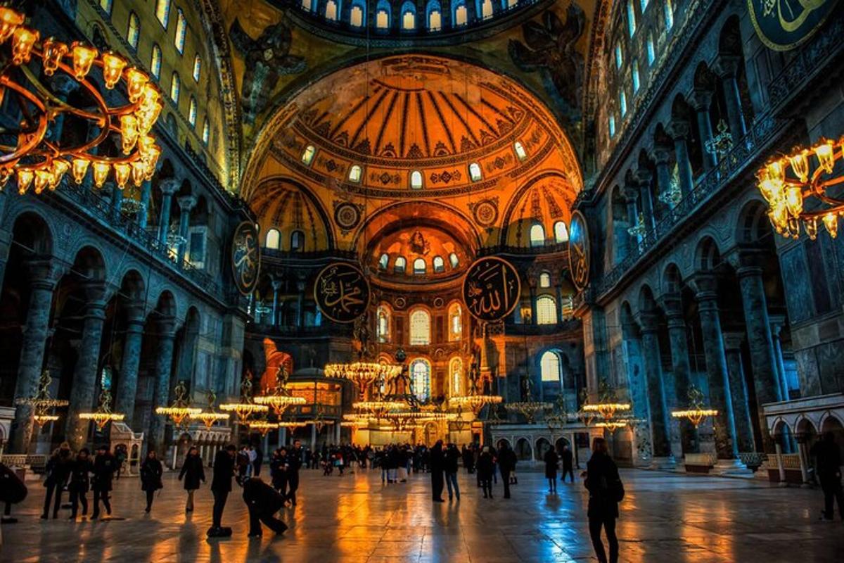 a group of people walking around a large building