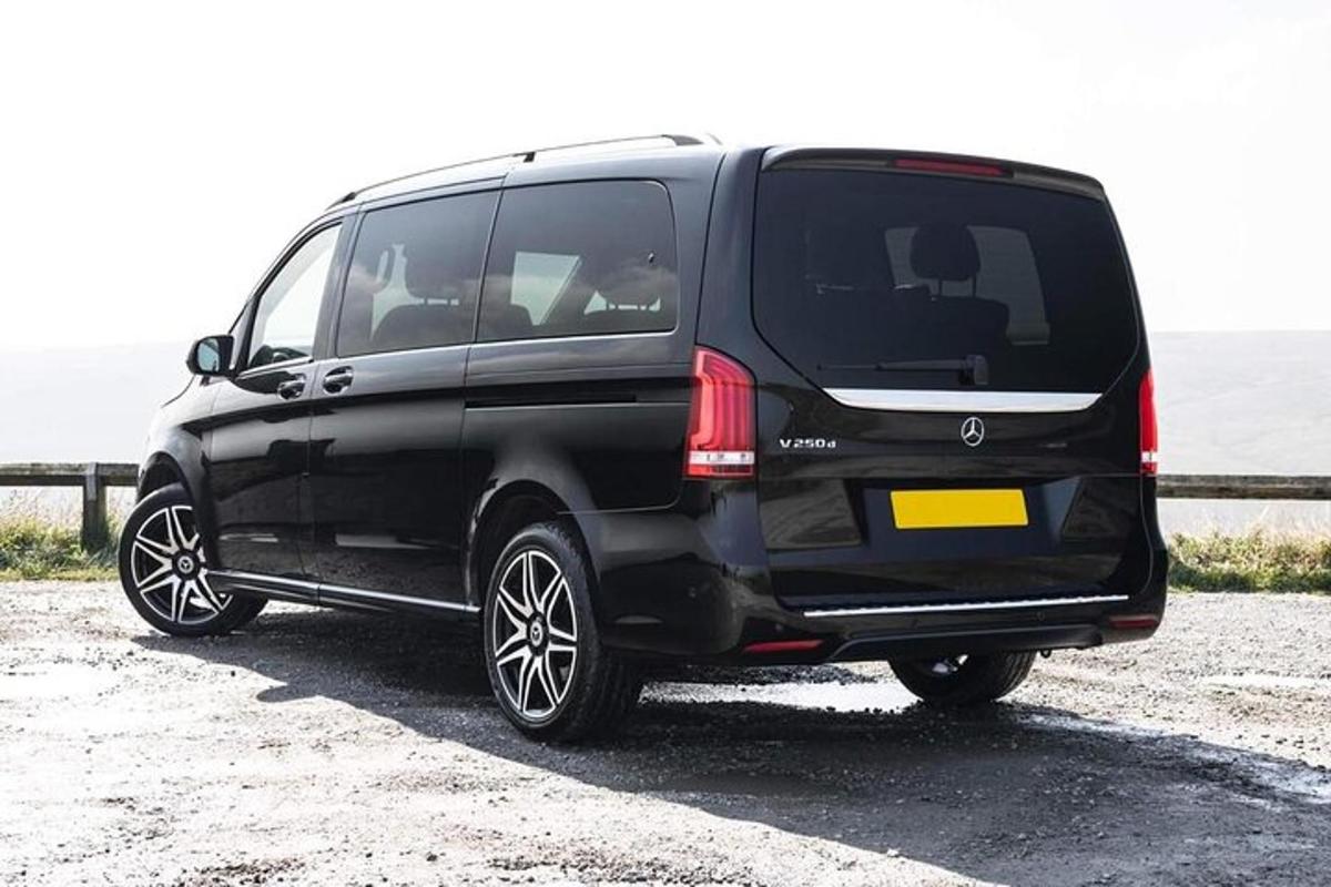 a black van parked in a parking lot