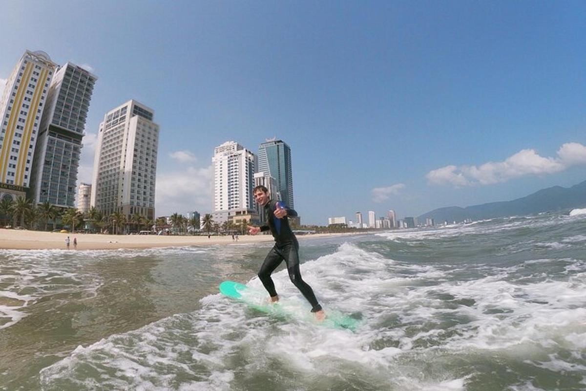 a man riding a wave on a surfboard in the ocean