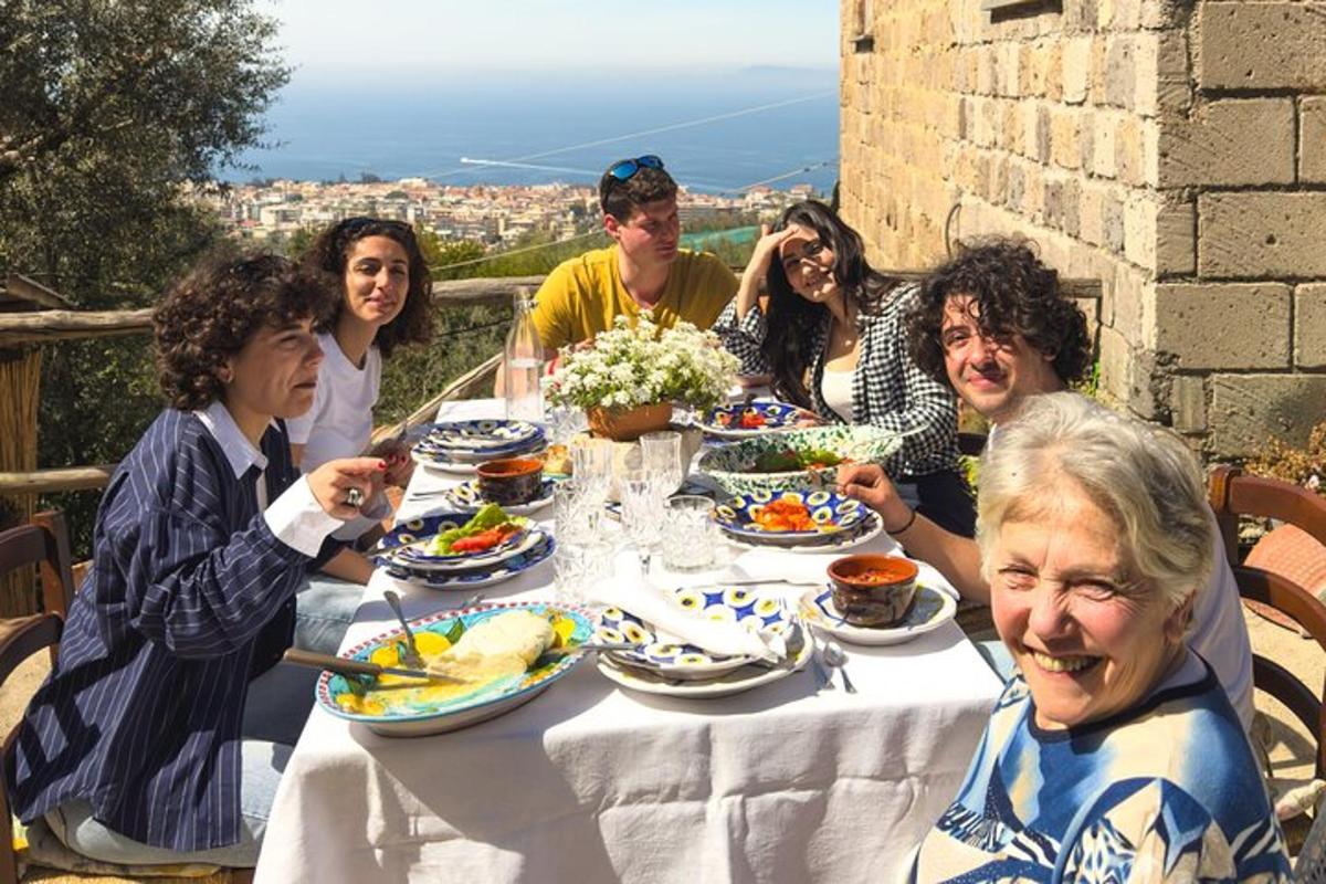a group of people sitting around a table eating food