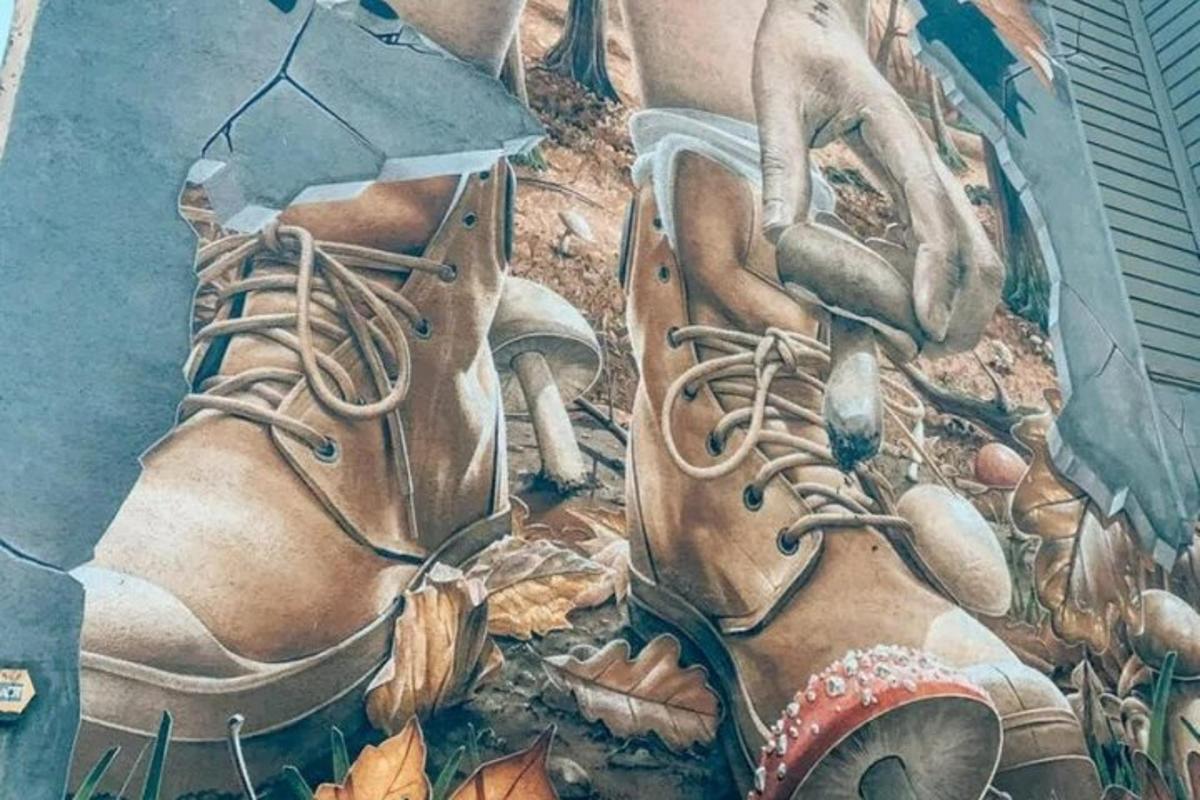 una pintura de una persona con un par de botas