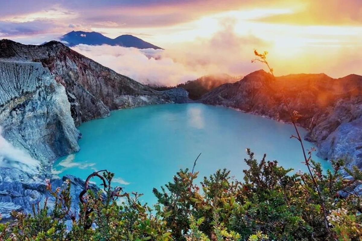 a view of a blue lake in the mountains