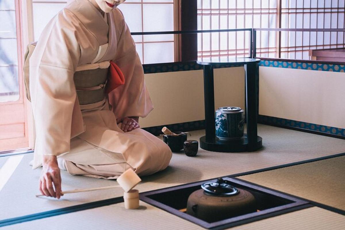a person in a kimono sitting on the floor