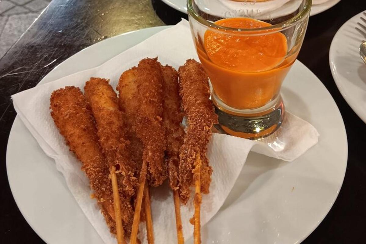 a plate with a bunch of food and a drink