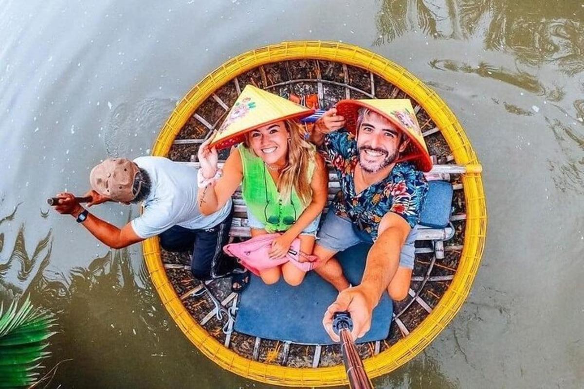 a group of people sitting in a boat in the water