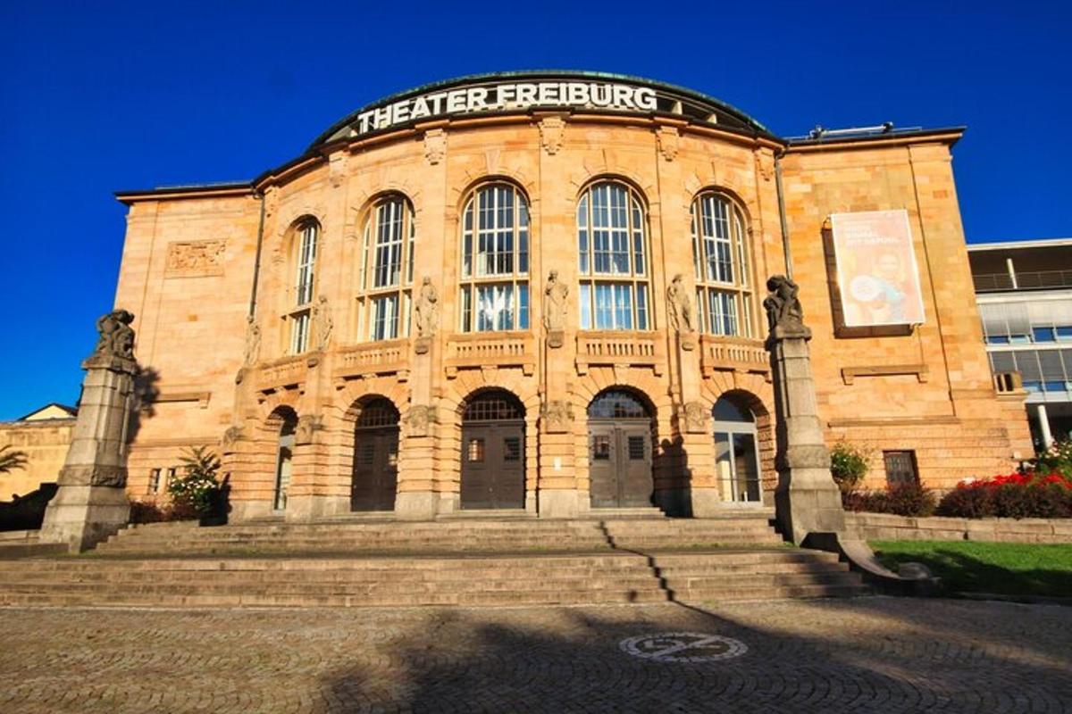 a large brick building with stairs in front of it