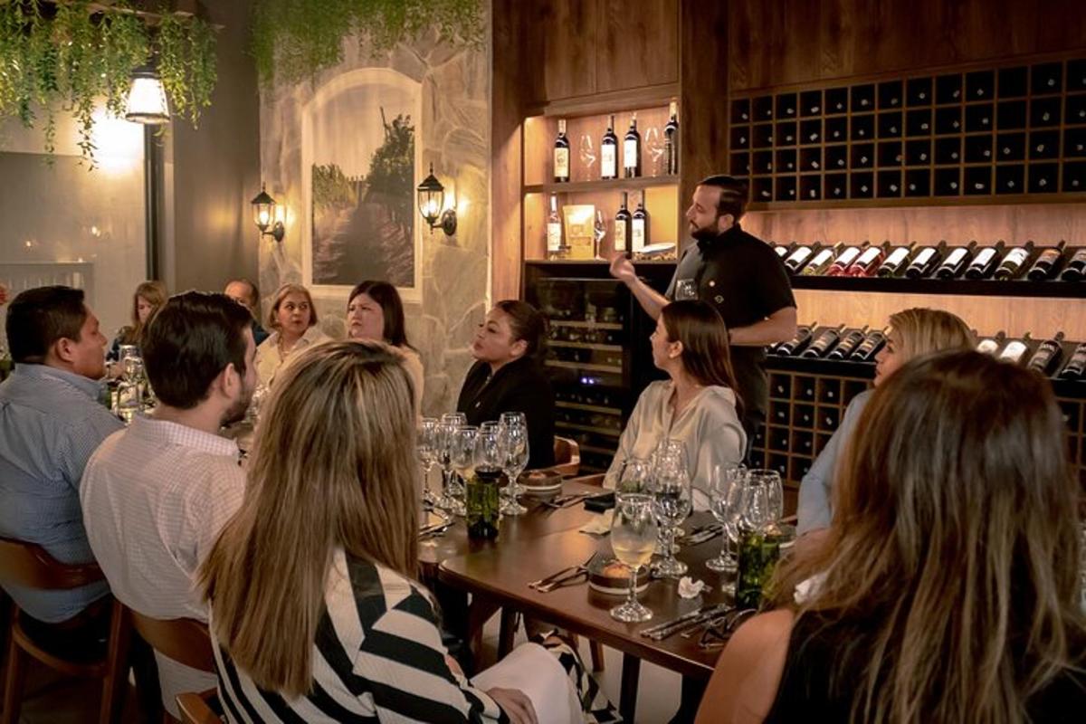 a group of people sitting around a table in a restaurant