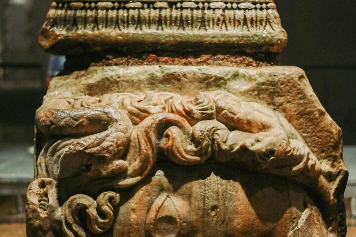 a statue of an octopus on the side of a column