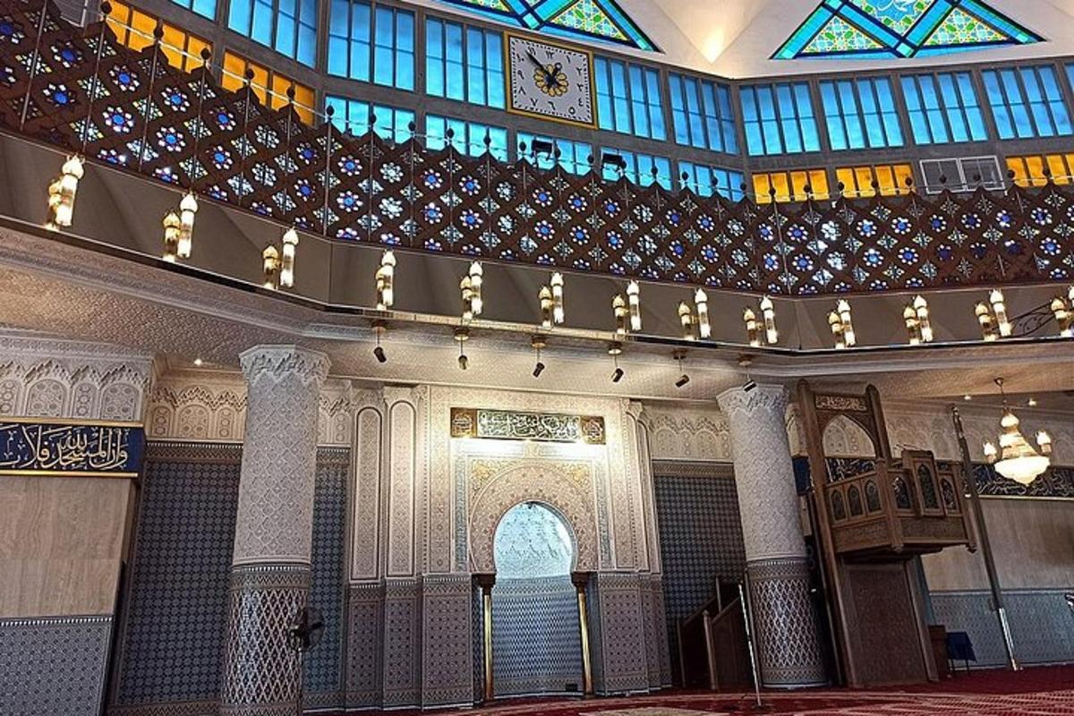 a large building with a ceiling and a balcony