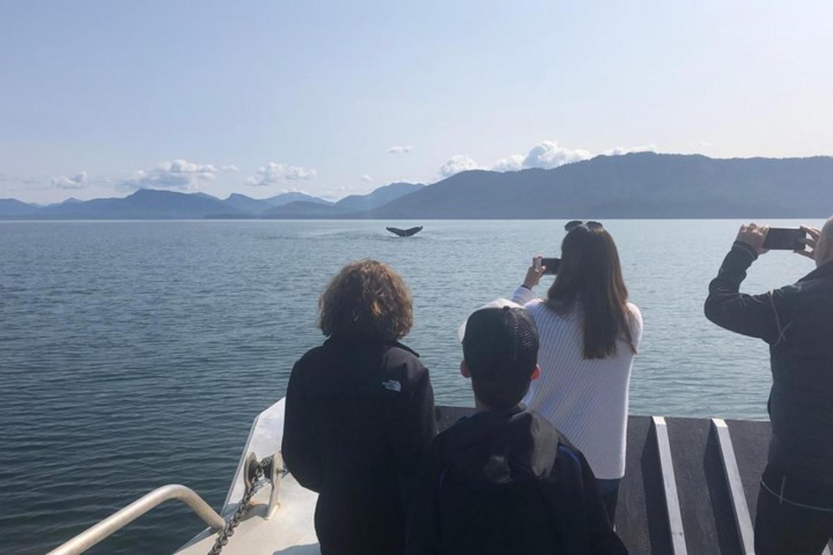 a group of people on a boat in the water