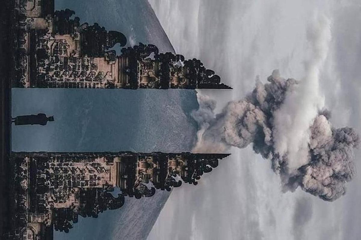 μια εναέρια άποψη μιας πόλης με καπνό να βγαίνει