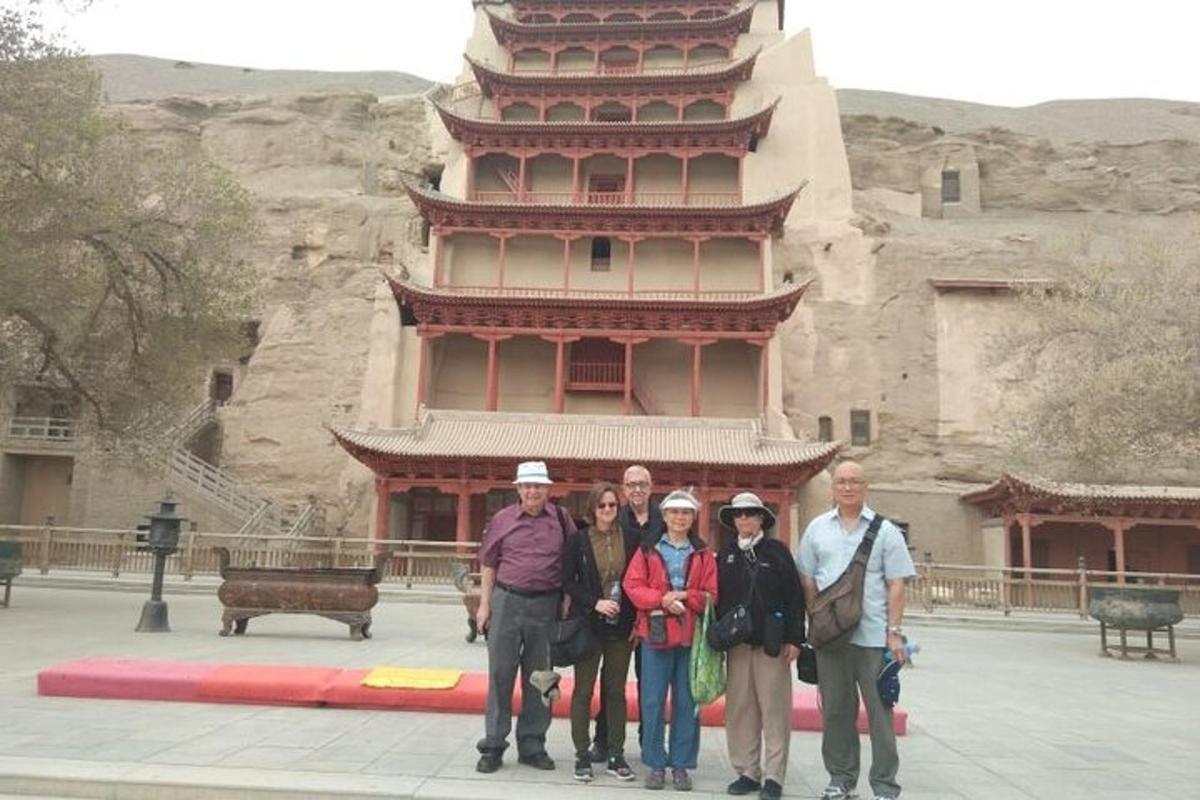 a group of people standing in front of a building