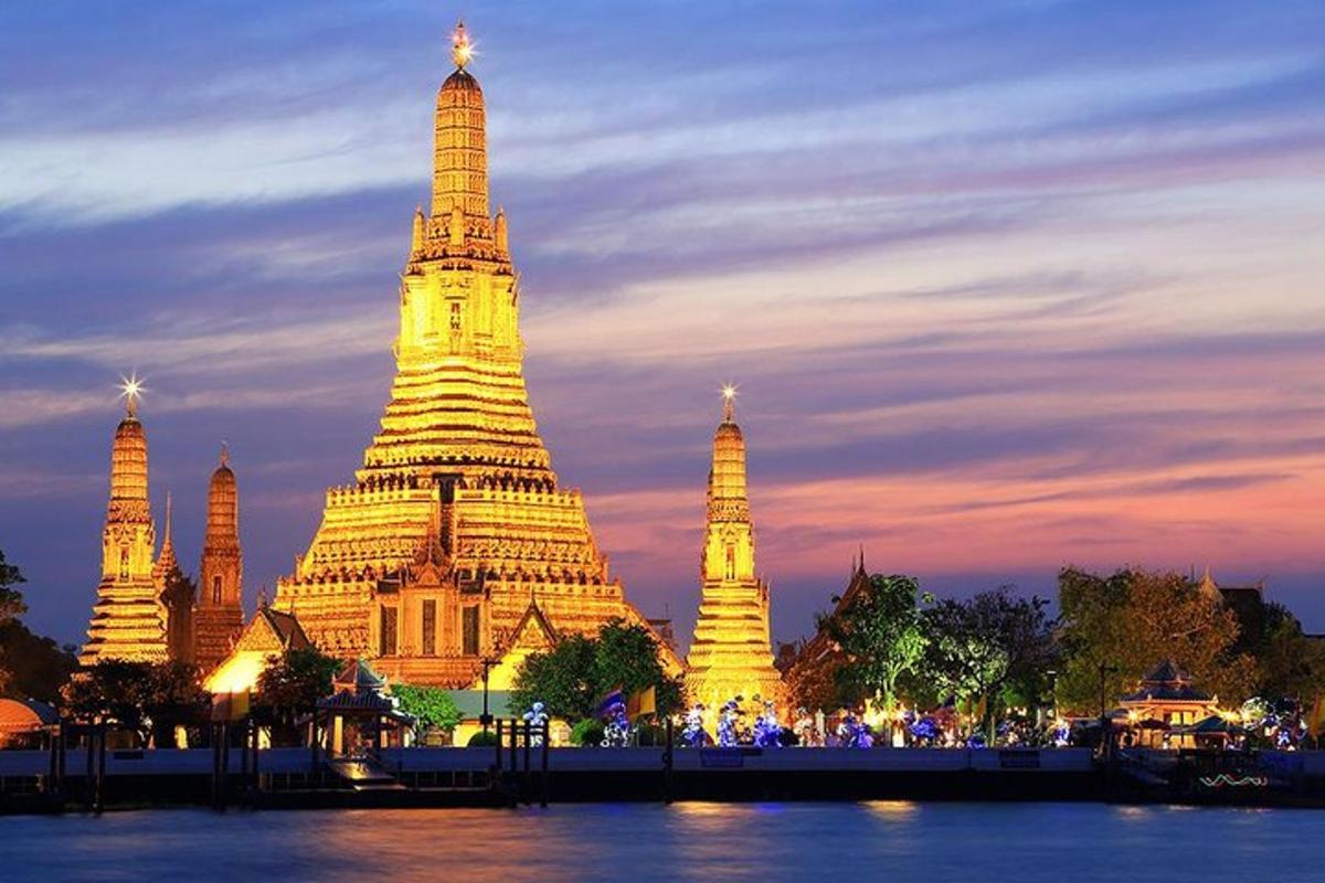 a large building with many towers at night