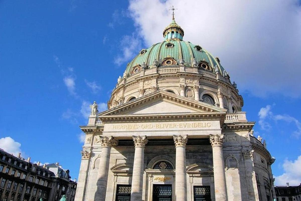 a building with a green dome on top of it