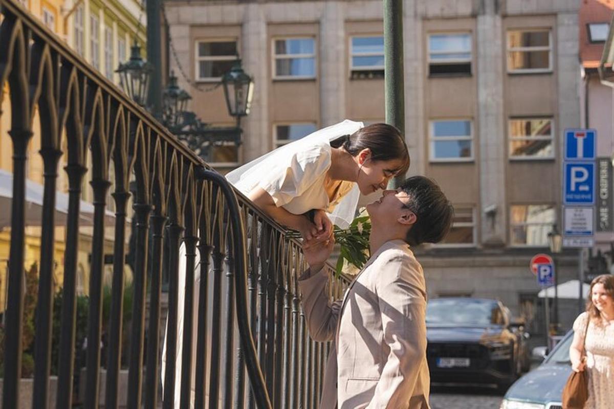a woman is looking at a man leaning on a fence