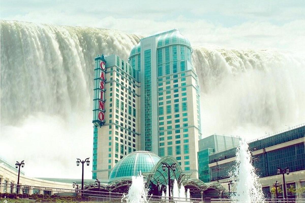 a large water fountain in front of a large building