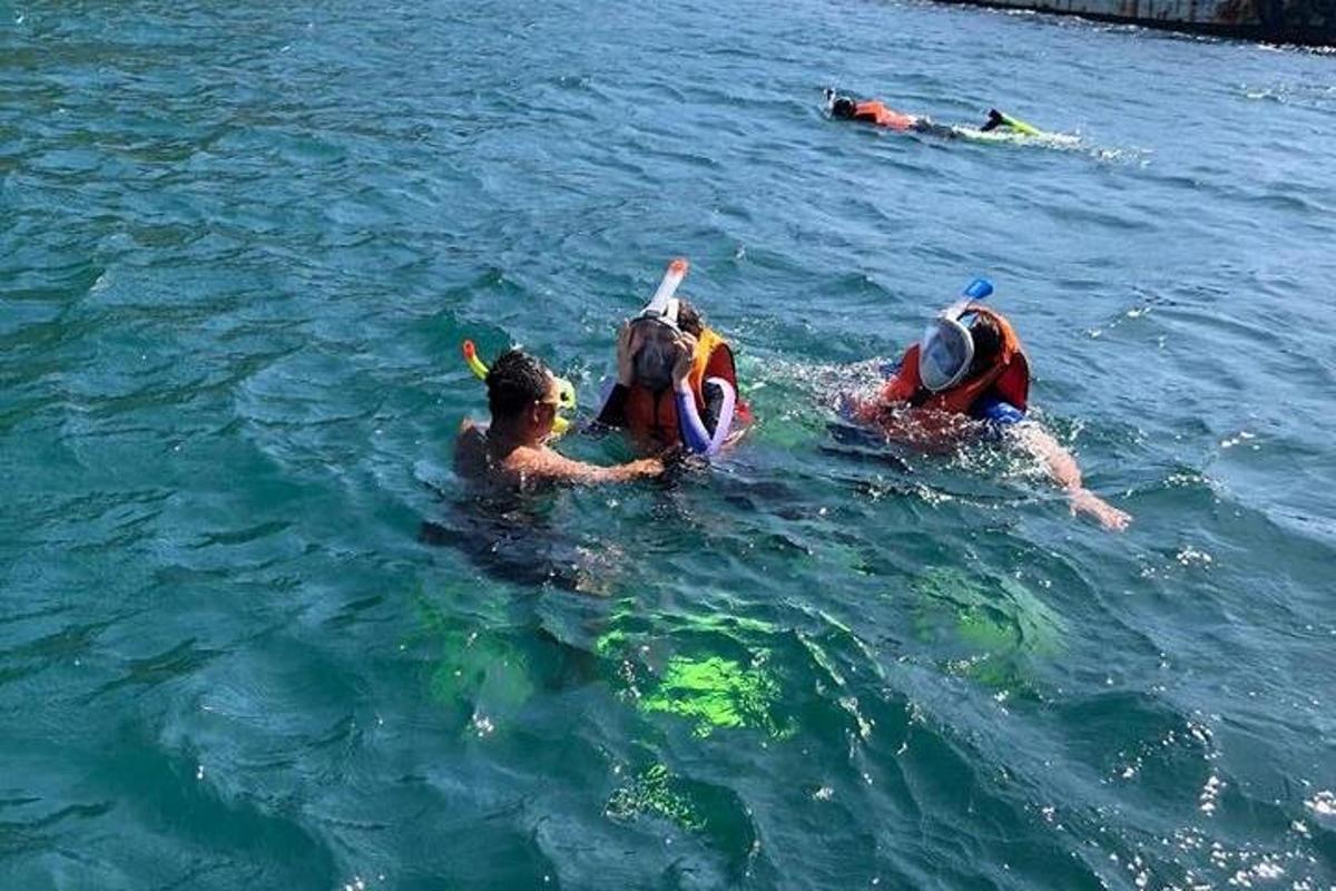 a group of people in the water