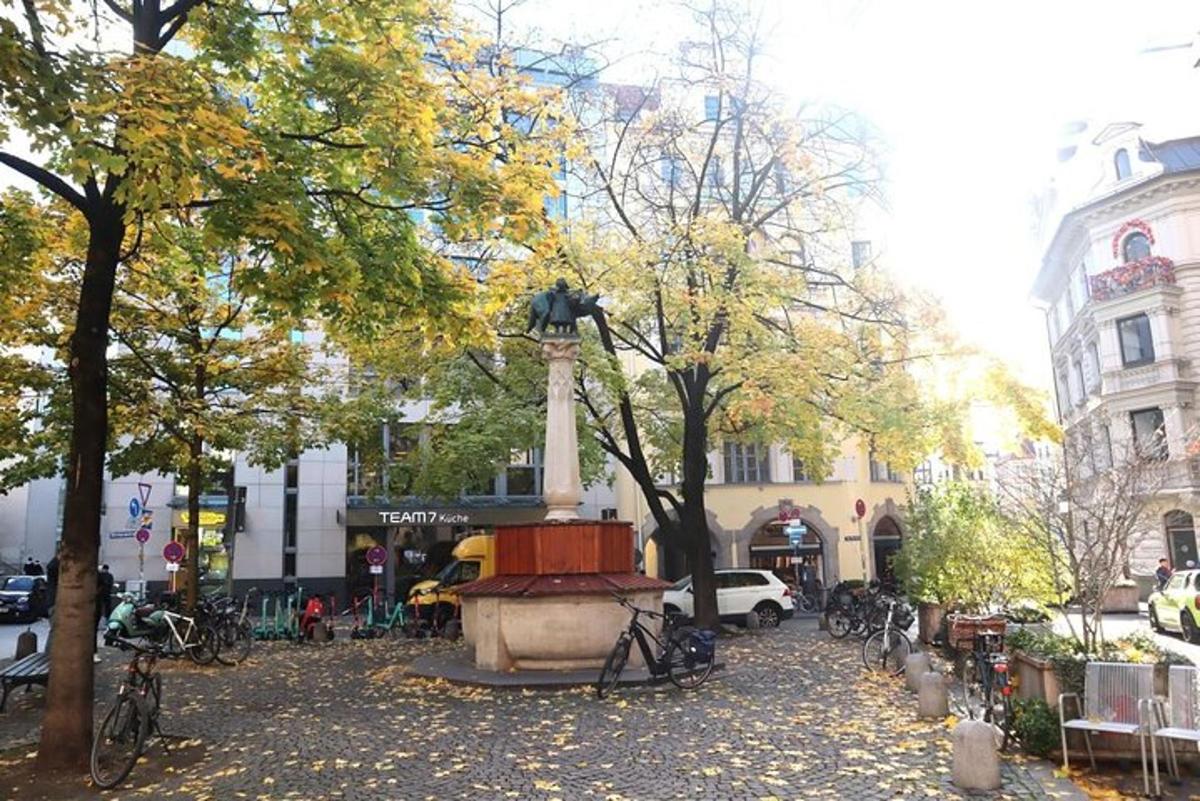 park s fontánou uprostřed města
