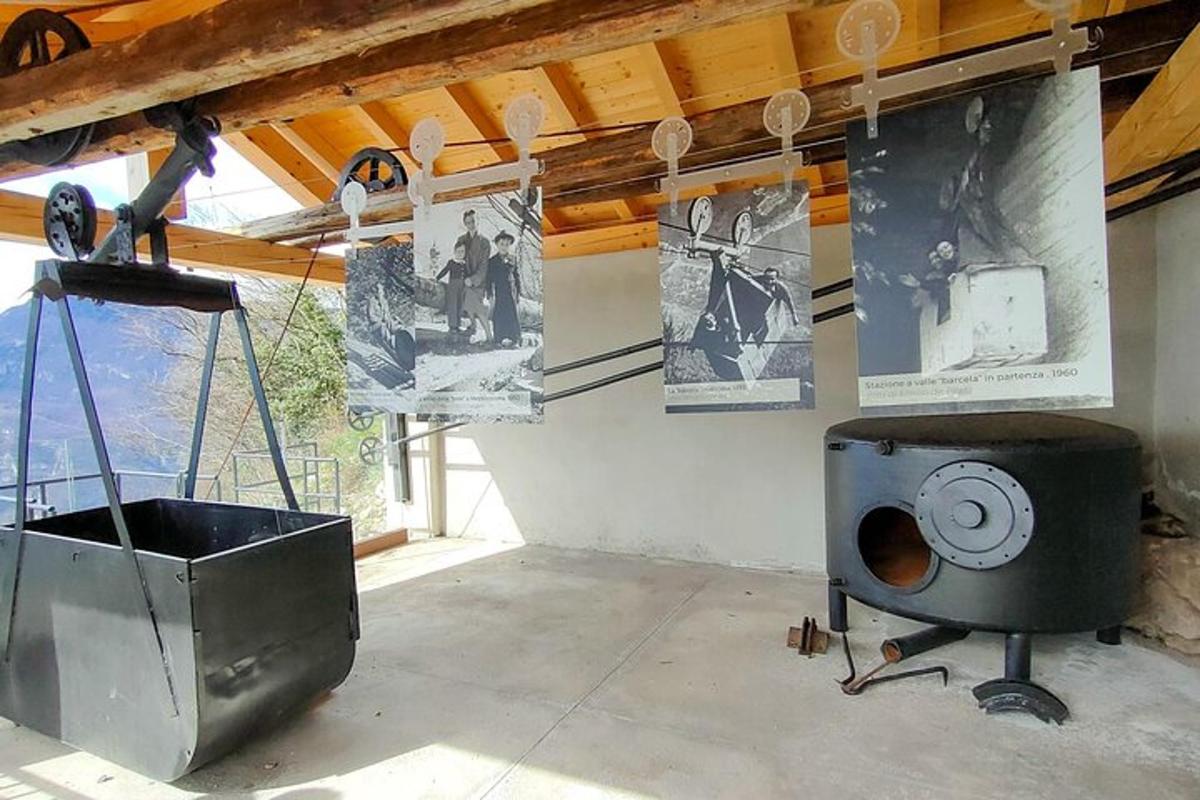 a room with a stove and a tv in it
