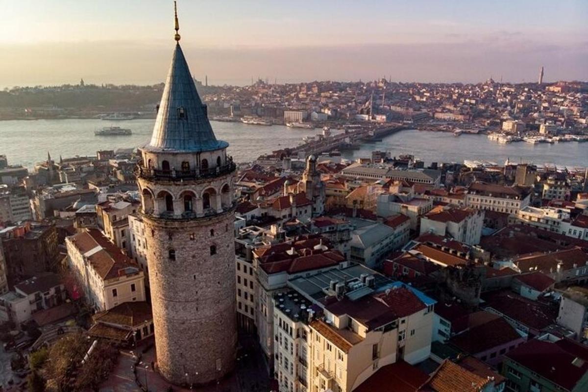 an aerial view of a city with a clock tower