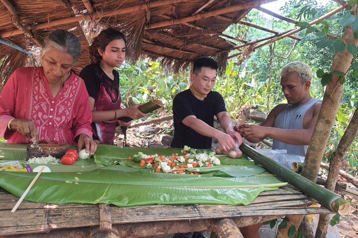 a group of people standing around a table with vegetables
