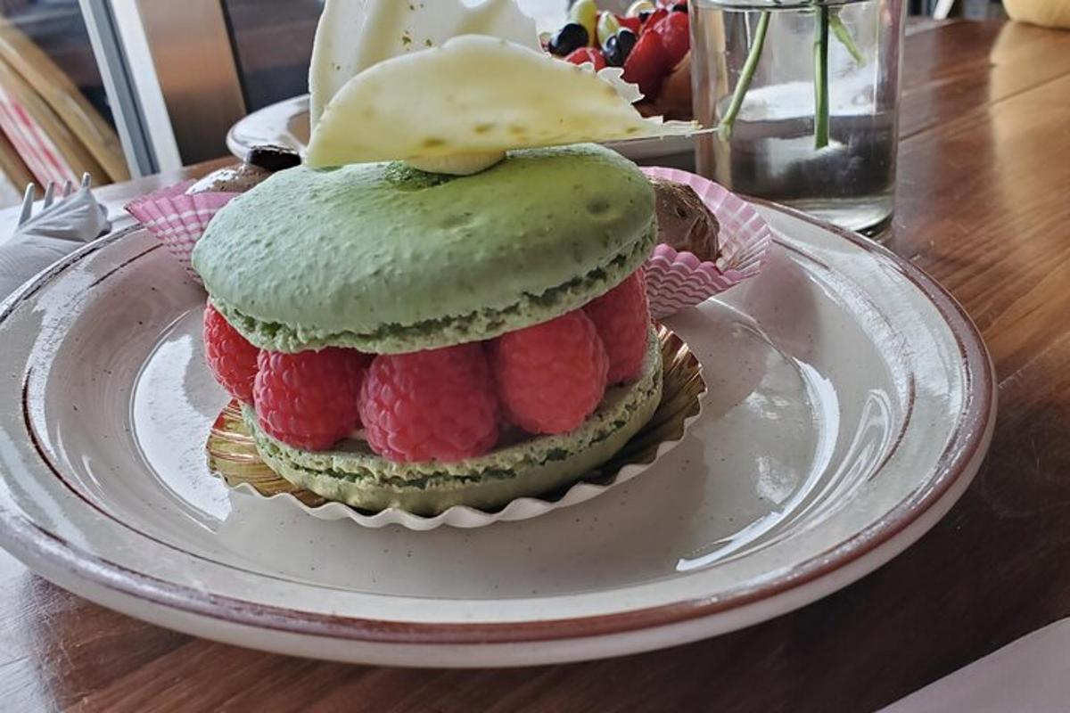 a sandwich with fruit on a plate on a table