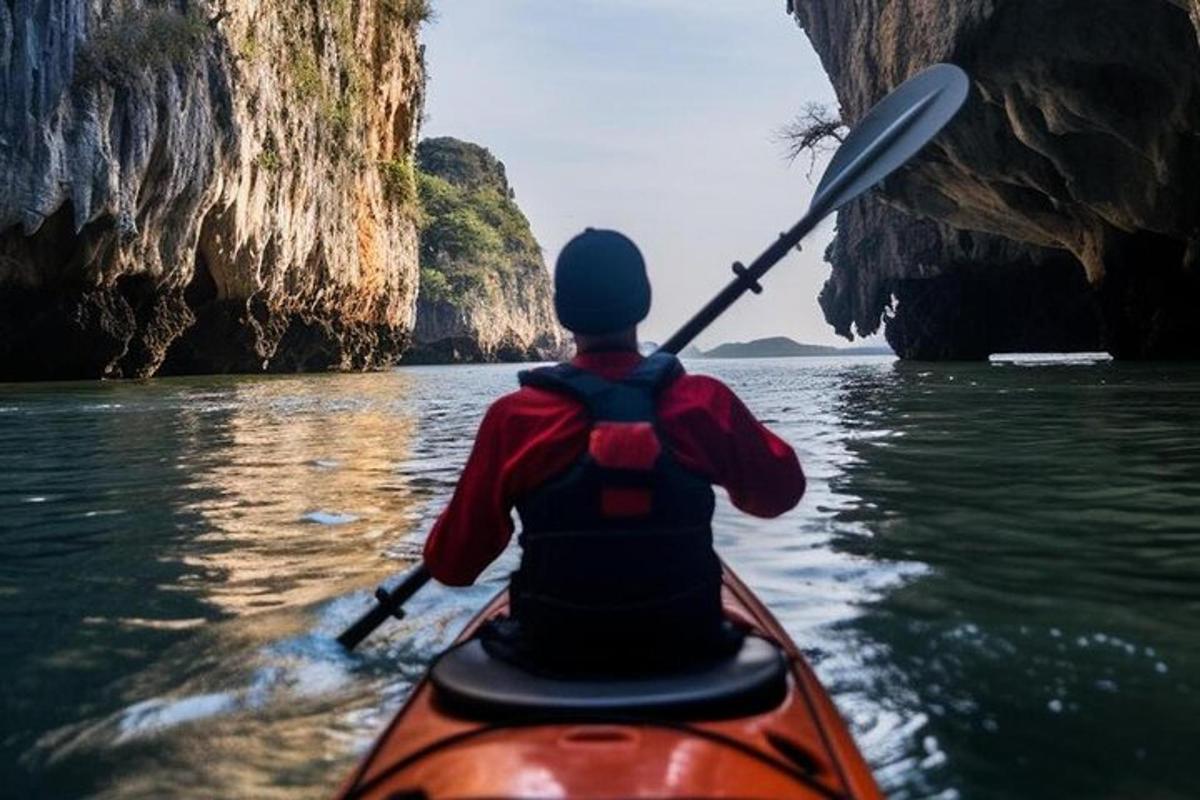 a person in a kayak in the water in a cave