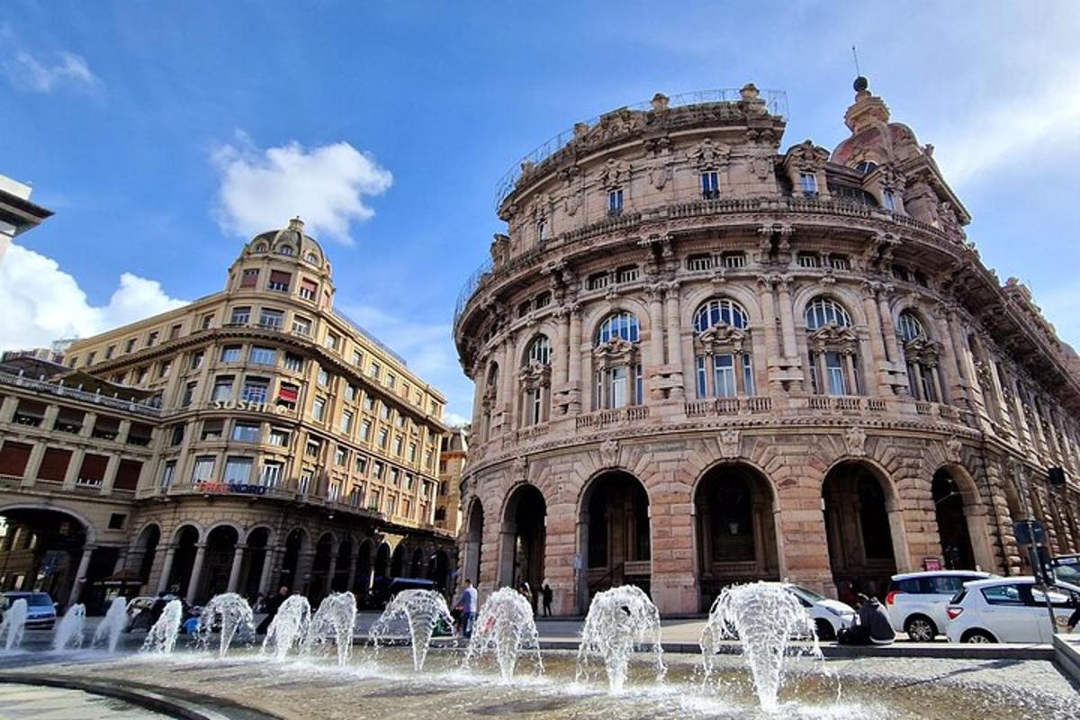 un grande edificio con una fontana di fronte
