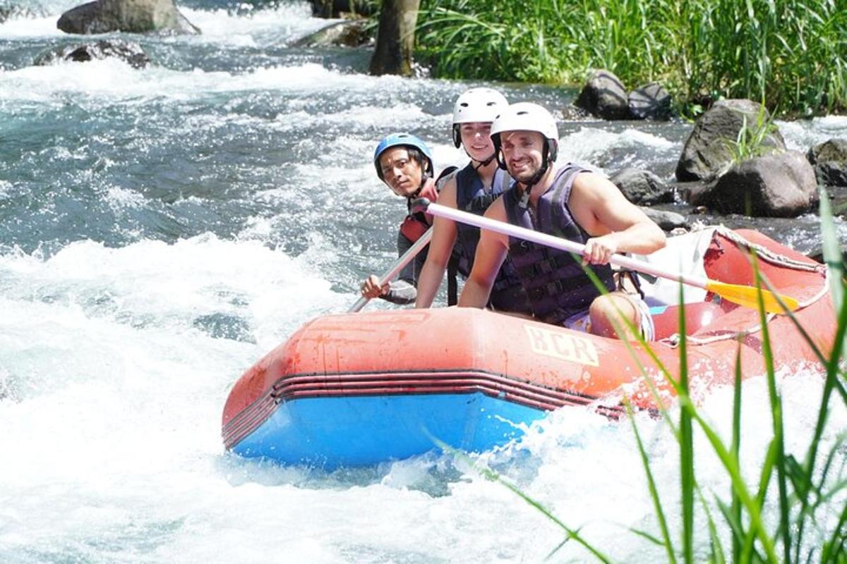a group of people in a raft on a river