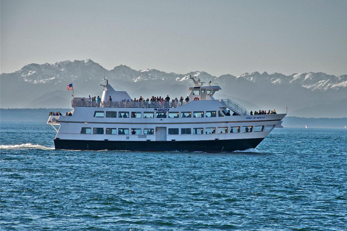 a large boat in the water with people on it