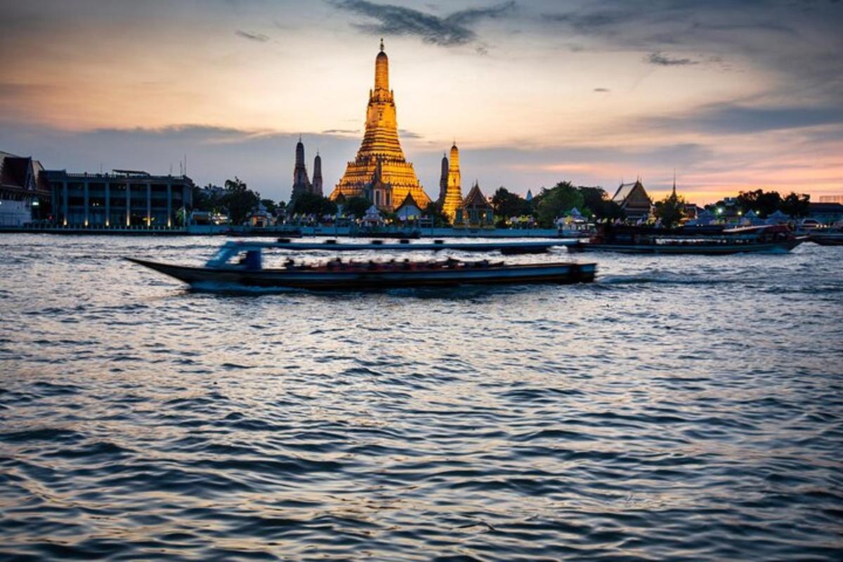 a group of people on a boat in the water