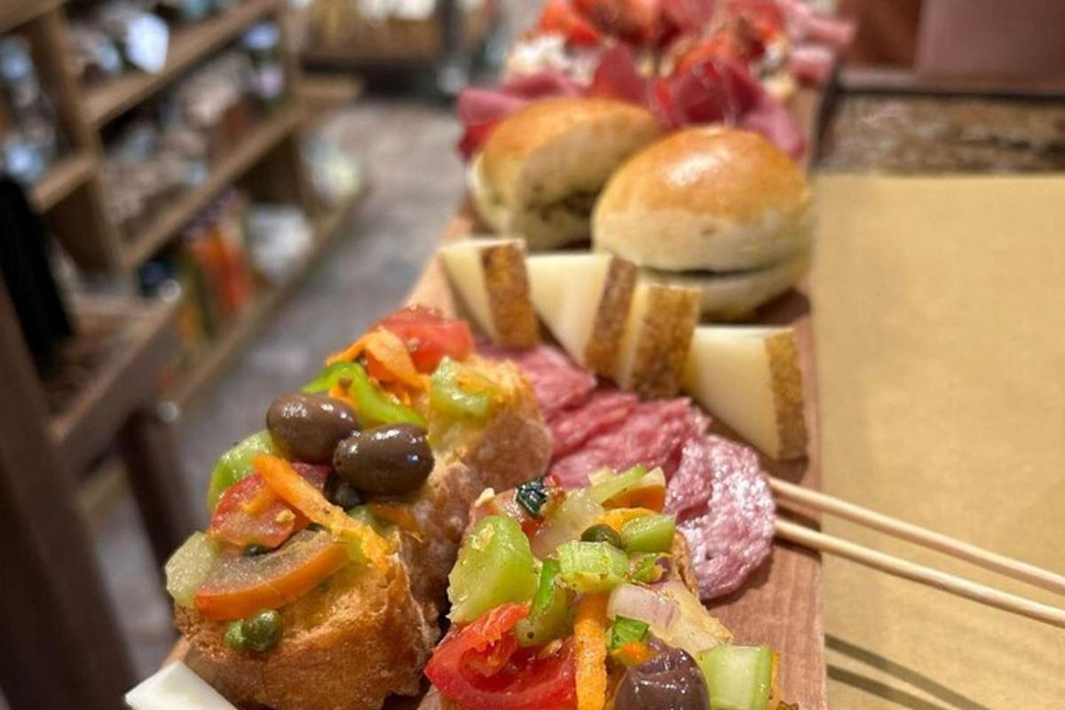 a tray of food with meat and vegetables on a counter