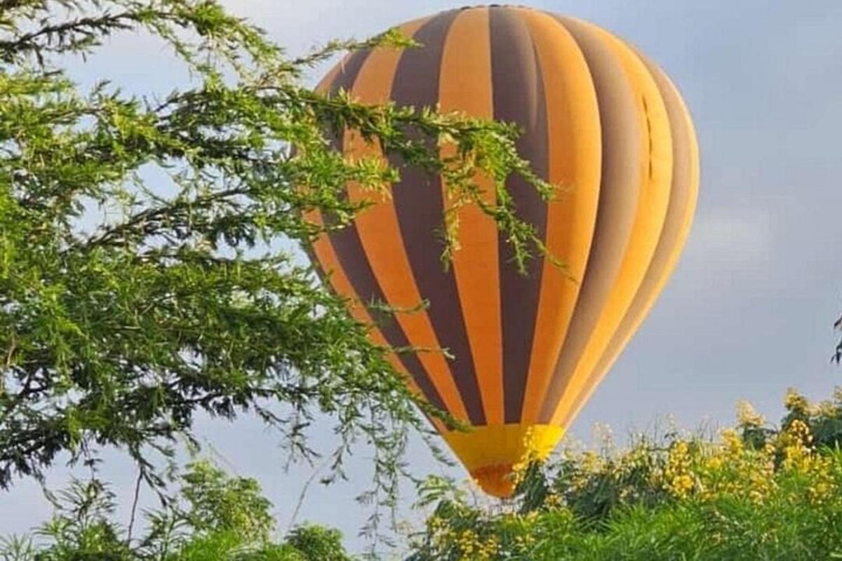 a hot air balloon is flying in the sky