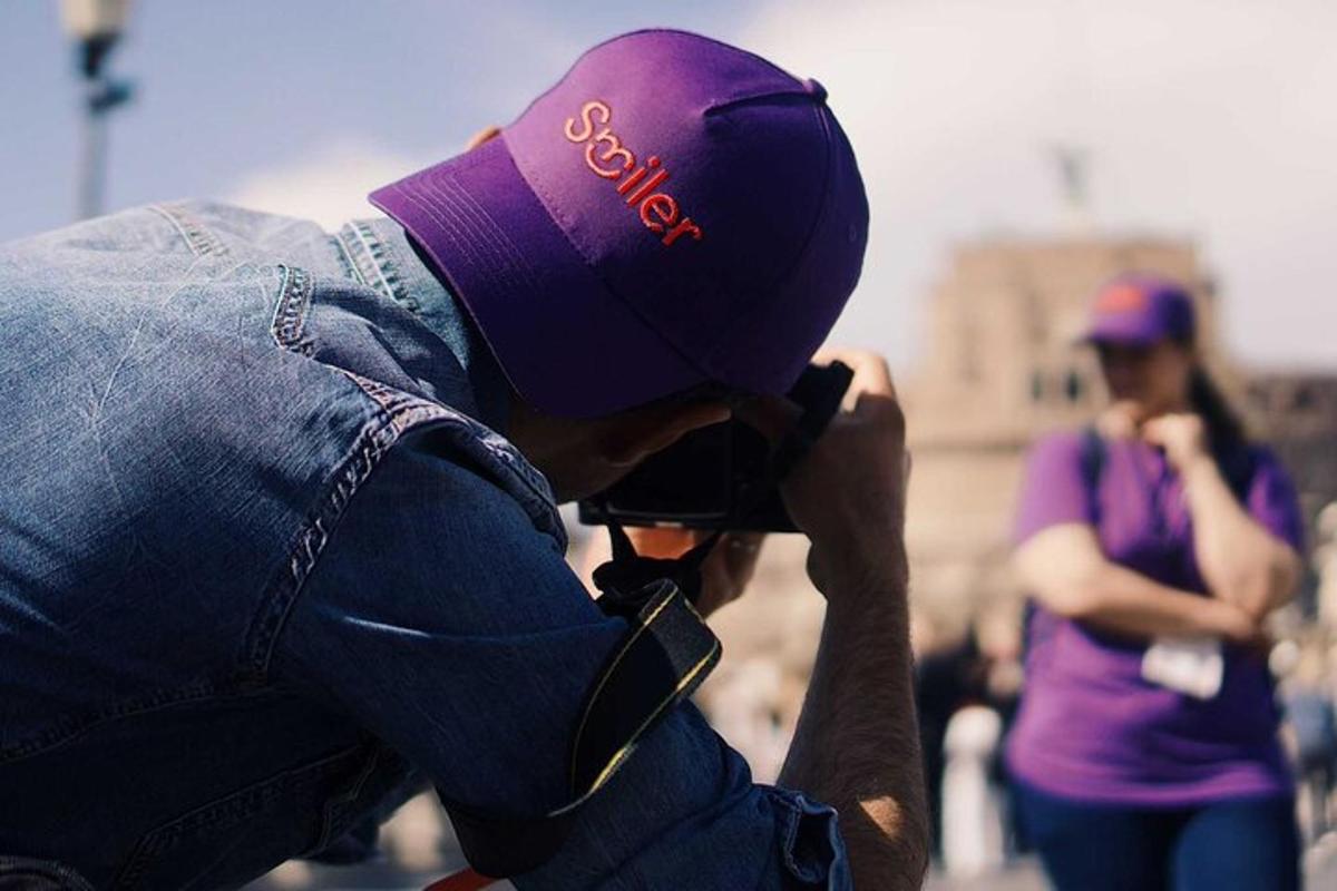a man taking a picture of a woman with a camera