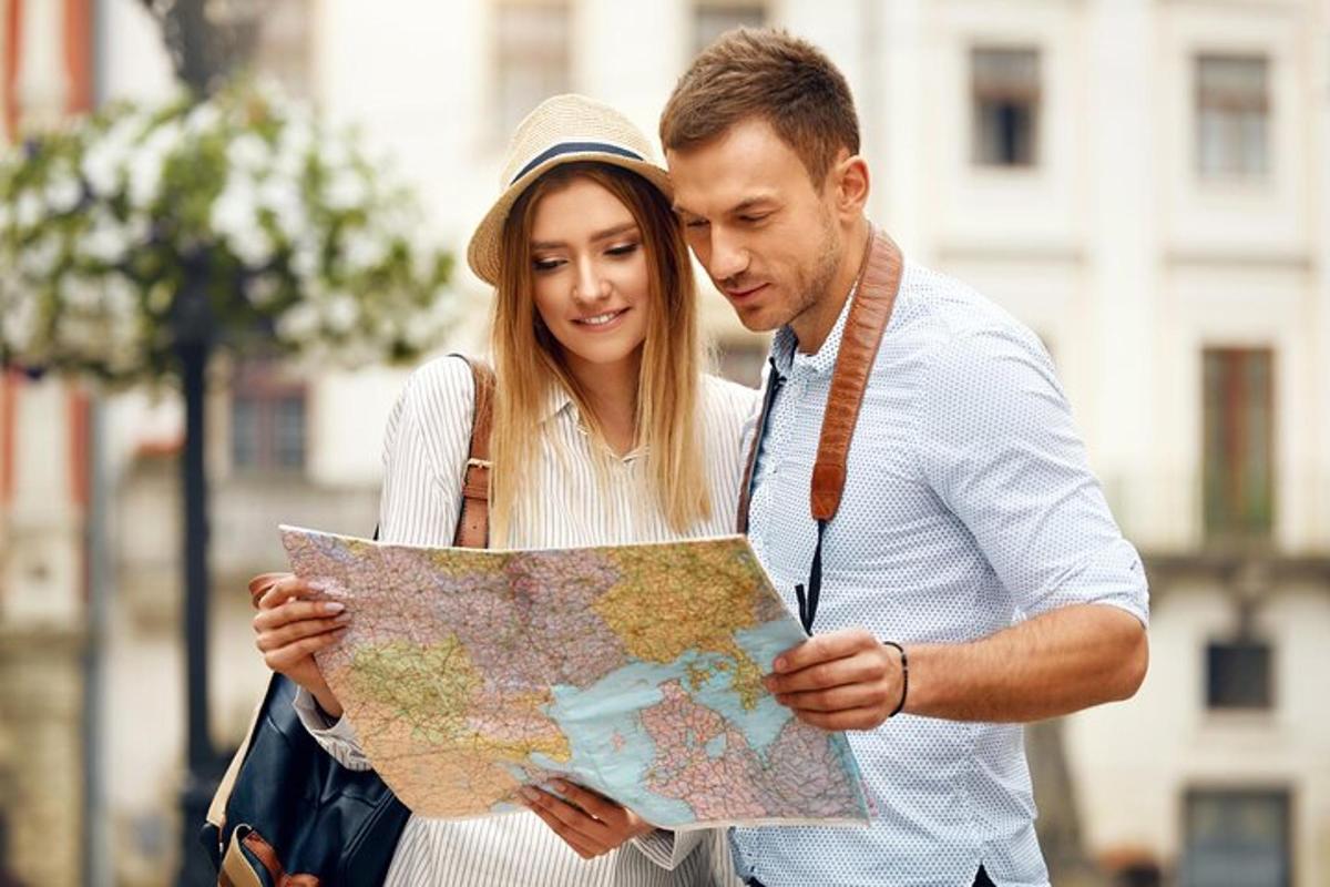 a man and a woman looking at a map
