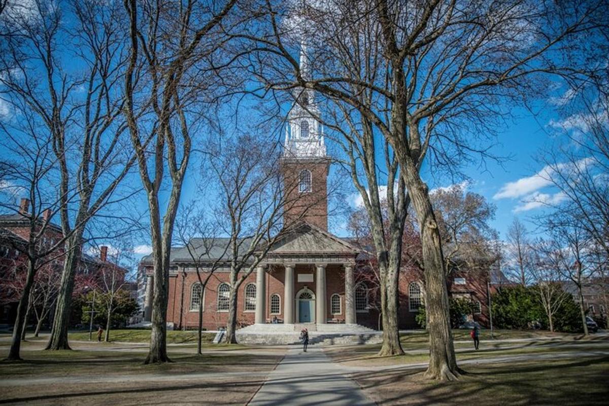 a large brick building with a clock tower on top