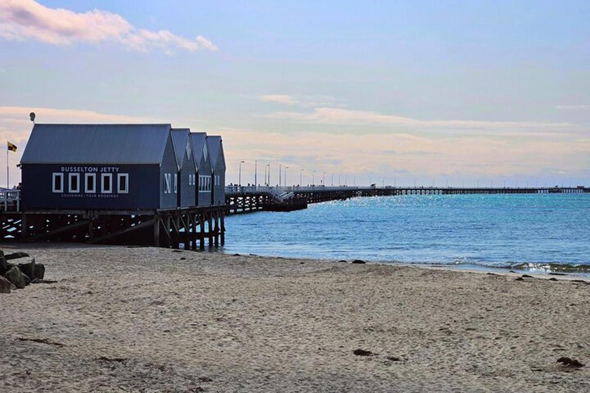 a building on a pier next to the water