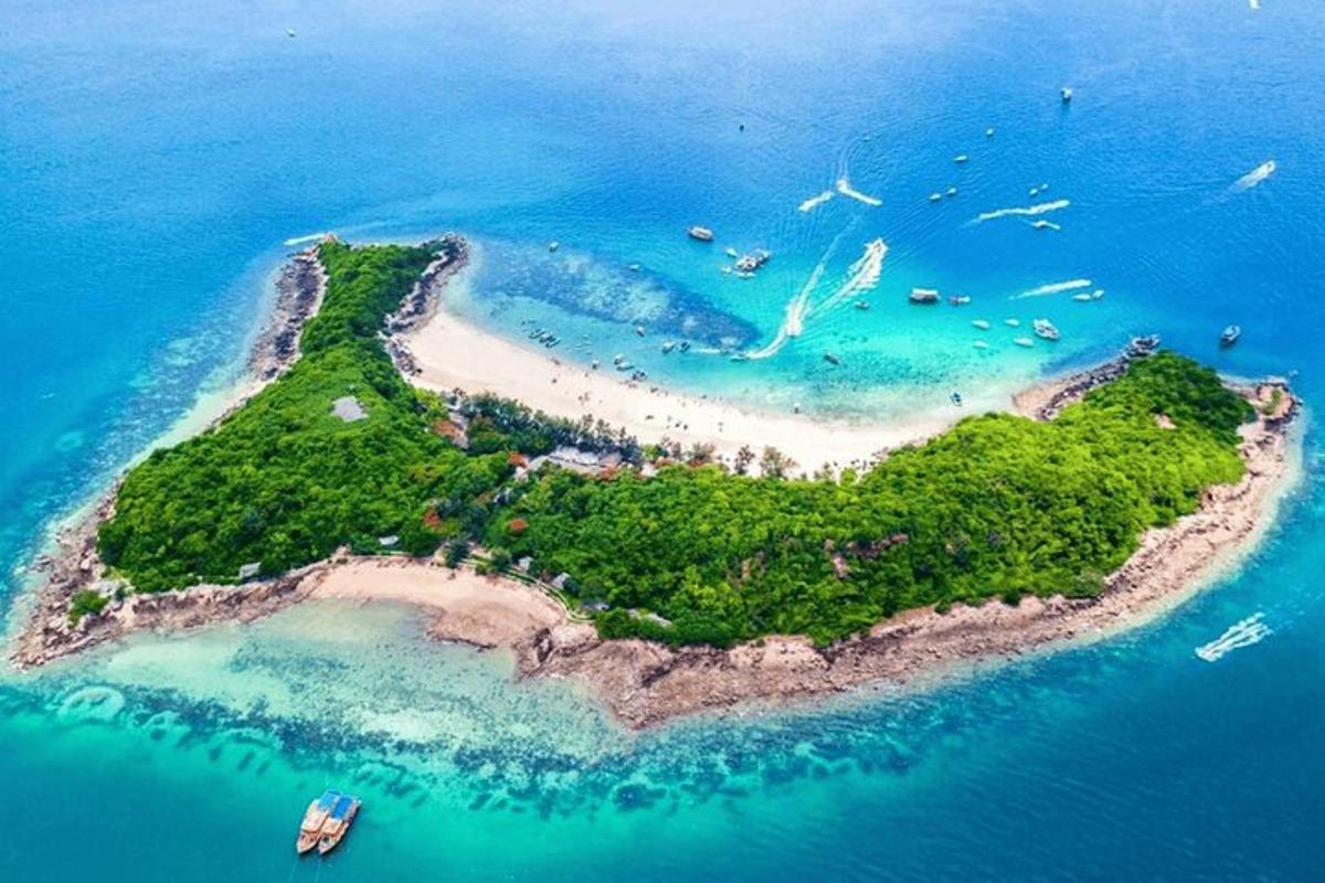 an island in the ocean with people on it