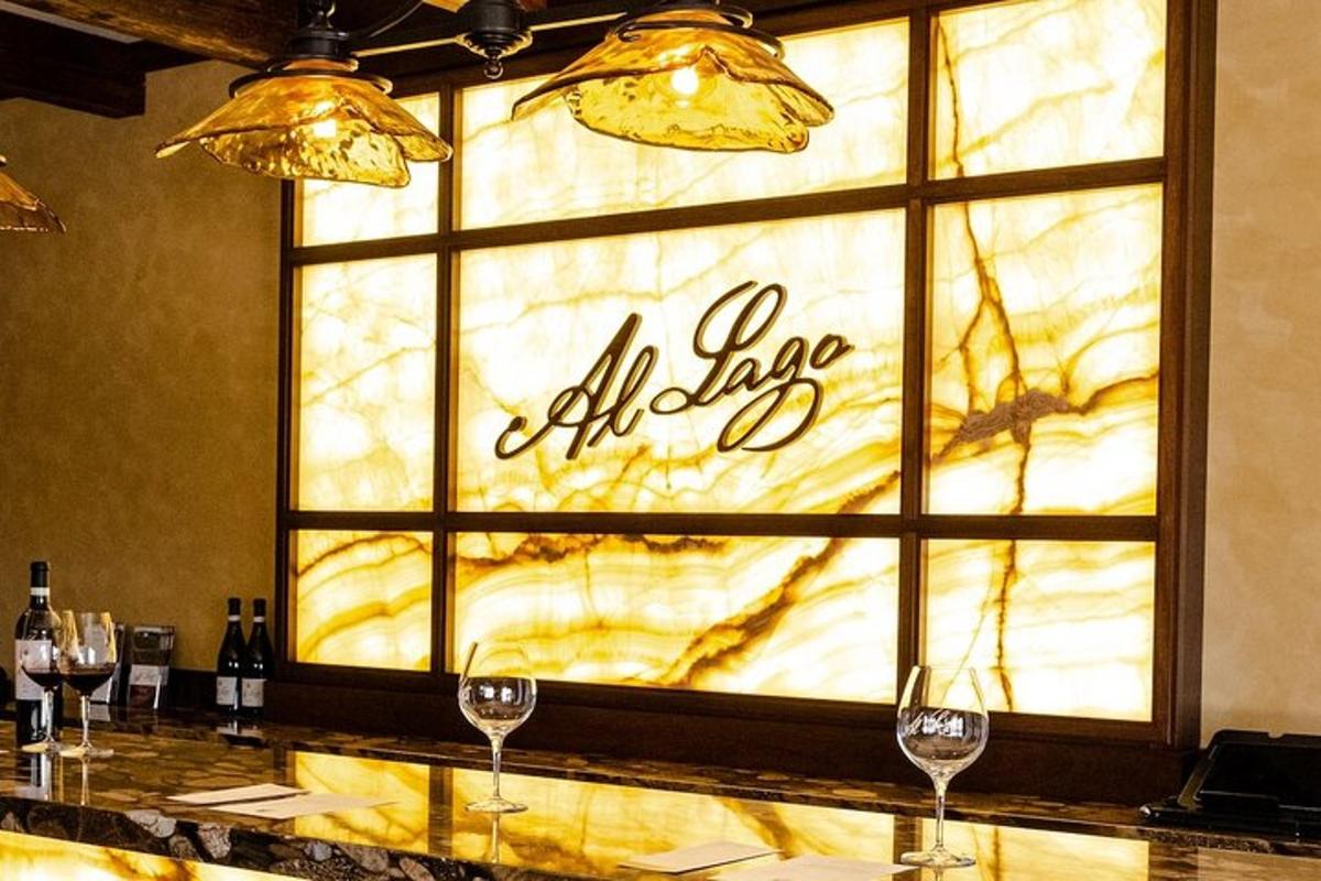 a window in a restaurant with wine glasses