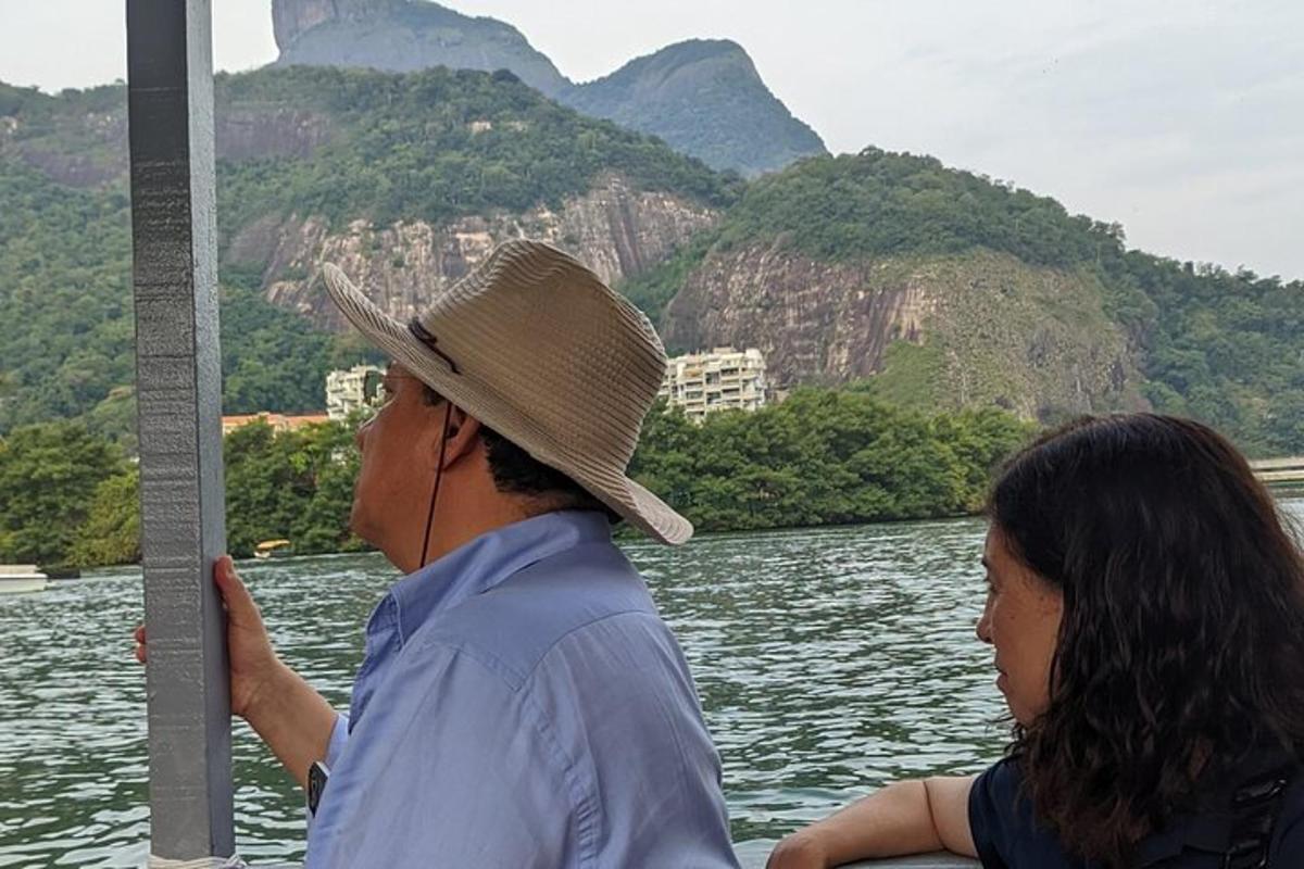 a man and a woman on a boat in the water