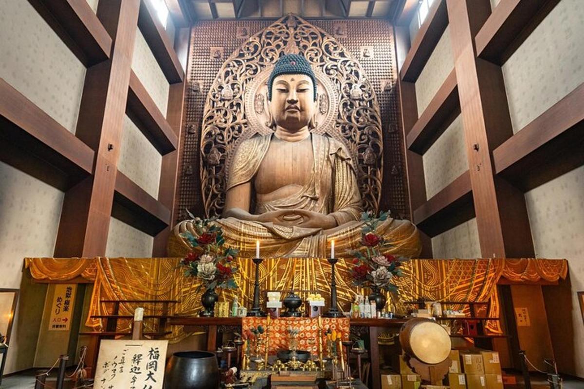 a large statue of a buddha in a temple